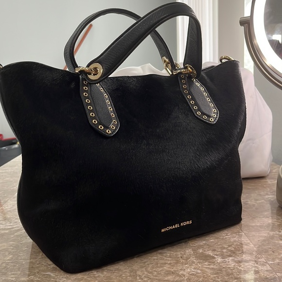 Michael Kors Handbags - Michael Kors Handbag Cowhide Black VERY RARE with Gold Rivets and Trim